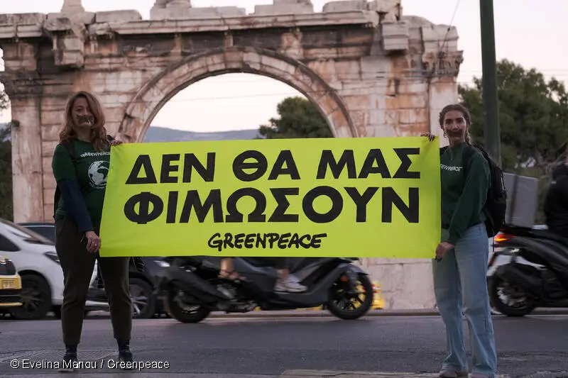 Greenpeace Greece employees stood in front of the historical landmark of Athens, the Arch of Hadrian, holding a banner with the statement "We will not be silenced", written in Greek, to protest against Energy Transfer's SLAPP lawsuit and to show solidarity, joining forces with the global Greenpeace network.